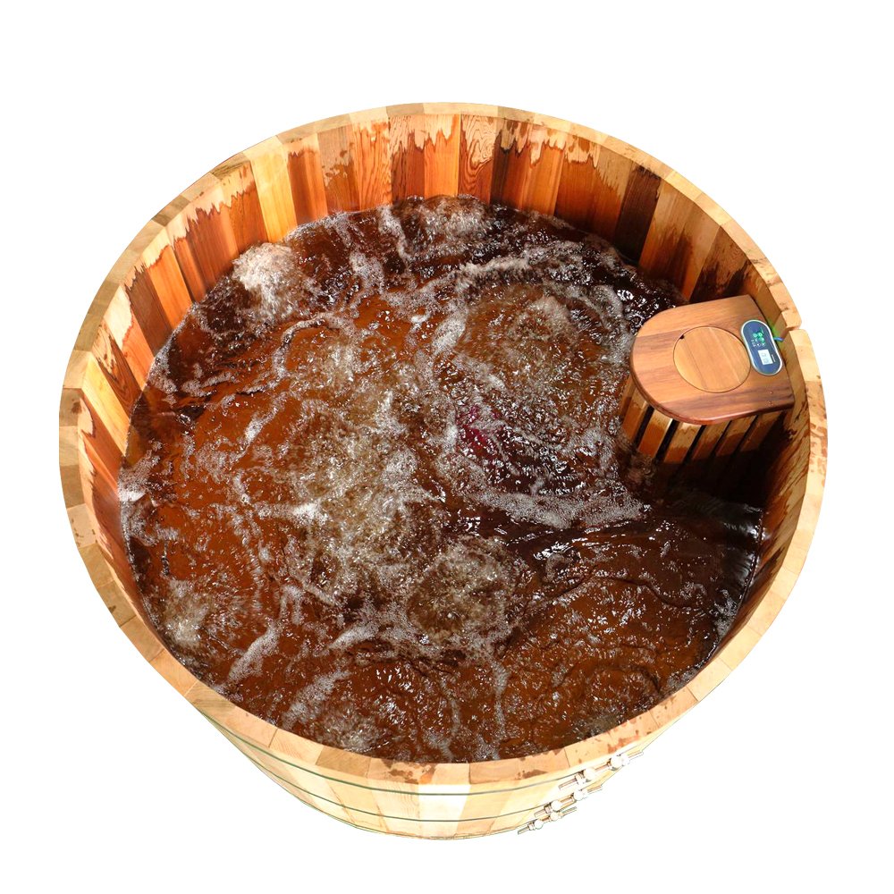 Interior of barrel-shaped hot tub with bubbling water, showing nozzle effect controlled by the smart system