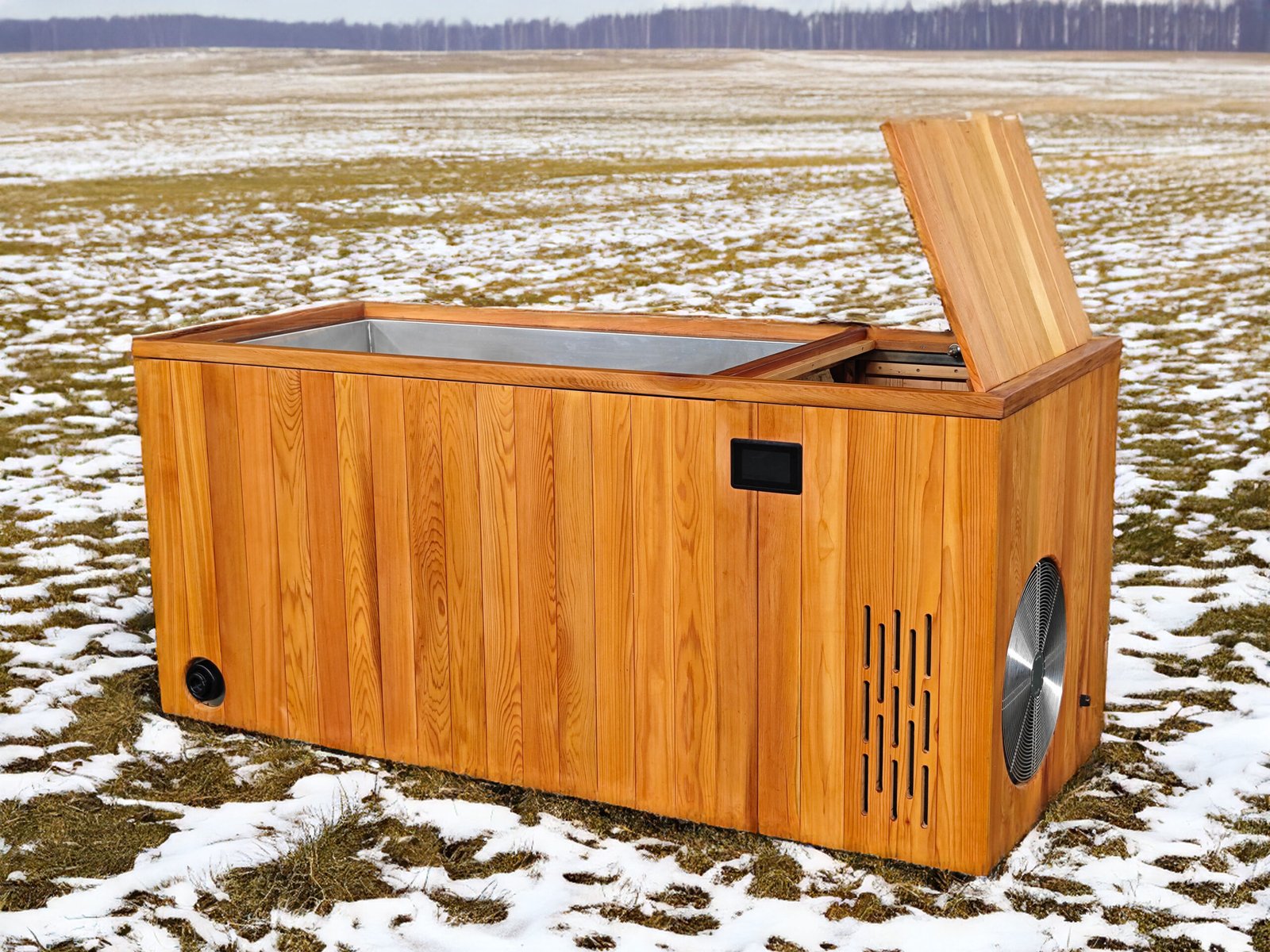 Red cedar cold plunge tub with smart control panel on a snow-covered grassy field